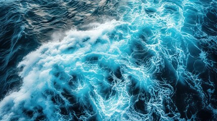 Abstract ocean wave texture in shades of blue, aqua, and teal, creating a captivating graphic resource for web banners. 