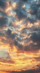 Obraz premium A serene sky adorned with subtle shades of gray, yellow, and orange, featuring soft clouds.