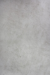 Texture of unfinished plaster with scratches
