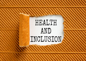 Health and inclusion symbol. Concept words Health and inclusion on beautiful white paper. Beautiful brown background. Business motivational health and inclusion concept. Copy space.