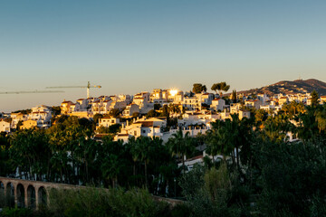 View of the sea and the village of Nerja at sunrise. Andalusia, Spain.