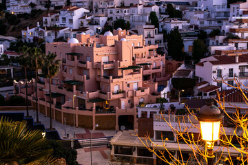 View of the city of Nerja, Andalusia, Spain. Sunrise over the seaside town.
