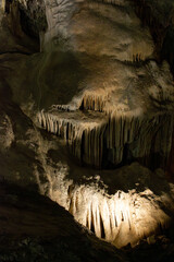 Stalactites and stalagmites in caves in Nerja, Spain. Rock paintings.