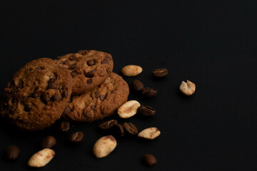 Fototapeta na wymiar trio of coffee cookies with chocolate chips and peanuts