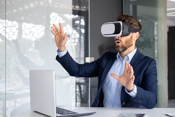 Professional businessman experiencing virtual reality headset in modern office, innovative tech concept