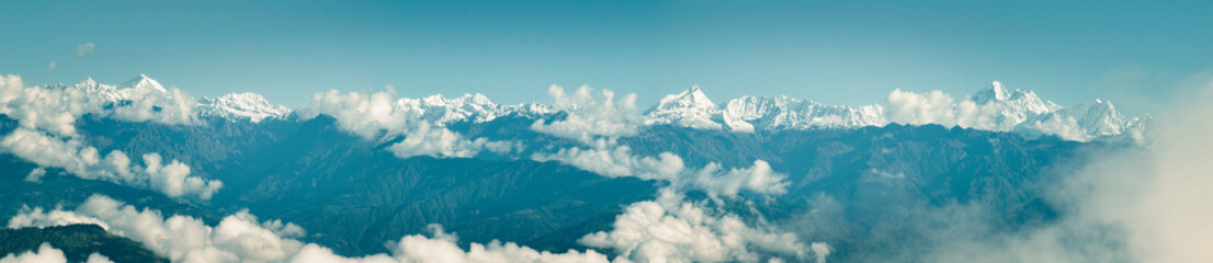 Aerial view of Himalayan mountain range seen from Nagarkot surrounded by clouds. The highest mountains in the world seen from Nepal.
