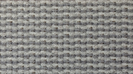 Close up of soft and warm grey fabric. Background for graphics