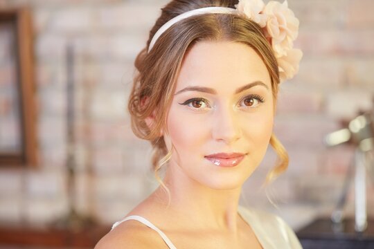 Closeup portrait of young bride in wedding glamour.