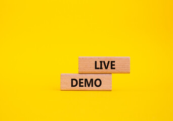 Live Demo symbol. Concept word Live Demo on wooden blocks. Beautiful yellow background. Business and Live Demo concept. Copy space - obrazy, fototapety, plakaty