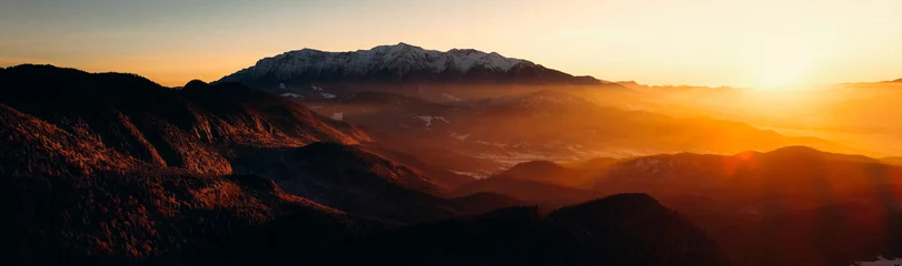 Deurstickers Mountains at sunset in winter.Top view of the mountains © Miha Creative