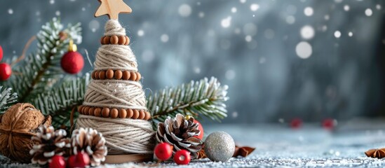 Handcrafted Christmas decorations made from natural materials like cotton thread and wood beads for winter and New Year holidays.