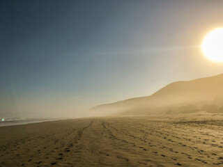 Fototapeta na wymiar Knysna beach at sunrise, a foggy morning, South Africa