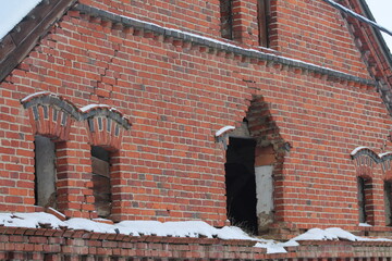 remains of a servant's house of a stable in old East Prussian in winter