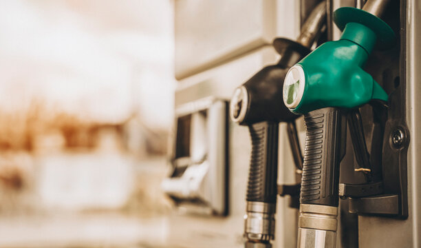 Close up of diesel and petrol fuel pistols at a gas station. The fuel crisis continues and the cost of fuel is going up