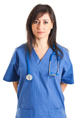 Confident female healthcare professional in scrubs