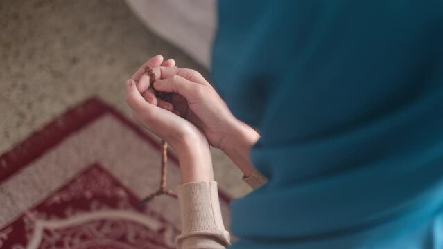 Muslim woman praying hijab Islam in Ramadan .