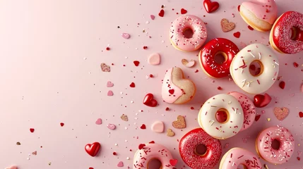 Fotobehang Donuts with gold, red, pink hearts sprinkles on dusty rose pink background. Sugar, calories, homemade sweets concept. st. valentines concept © sderbane