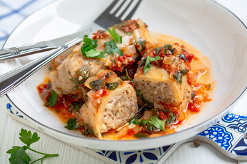 Cabbage rolls with meat and bulgur or rice.