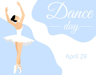 International Dance Day. Young ballerina on a light blue background.