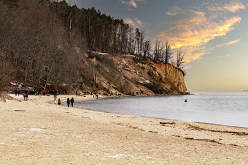 Rocks and sandy beach on the coast of the Baltic Sea in Gdynia	