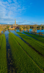 Wide Angle Aerial shot of Salisbury Cathedral and flooded Meadows