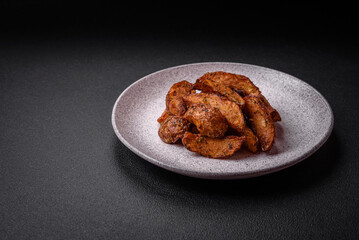 Delicious crispy potato wedges with garlic, salt, spices and herbs