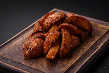 Delicious crispy potato wedges with garlic, salt, spices and herbs