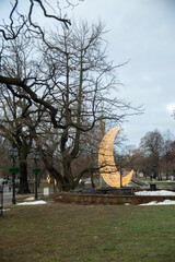 Obraz premium Riga in winter, Vermanes-Park against a blue sky. Vertical frame. Riga, Latvia. High quality photo