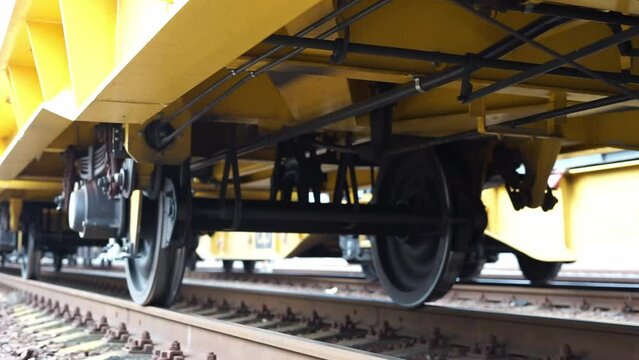 the bottom of the train car wheels