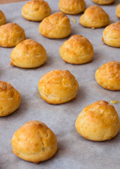 Choux pastry balls with cheese, gougères. French gastronomy