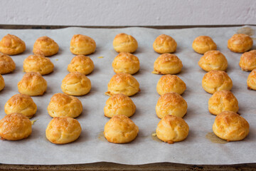 Choux pastry balls with cheese, gougères. French gastronomy