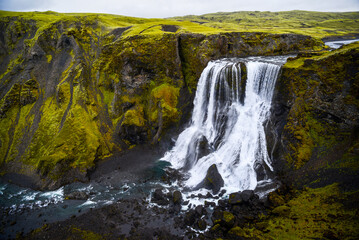 Obraz premium Beautiful Fagrifoss waterfall on the way to Lakagígar, Iceland.