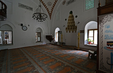 Lapseki, Turkey. June 11, 2023. Gazi Yakup Bey Mosque and Caravanserai in Lapseki, Turkey. It was...