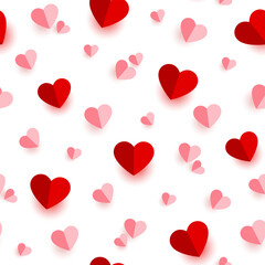 Seamless pattern with colorful paper hearts of different sizes.
