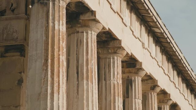 Doric marble columns in collonade of Temple of Hephaestus in Ancient Agora, Athens, Greece. Ancient Greek architecture