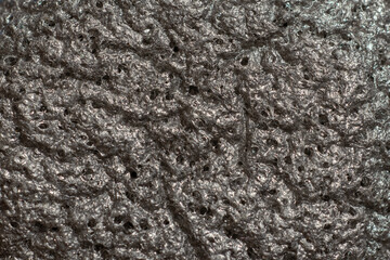 Konjac bamboo charcoal black sponge texture. Antibacterial sponge for facial cleansing