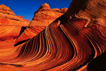 Sunrise on The Wave sandstone formation, Coyote Buttes North, Vermilion Cliffs National Monument, Arizona, Southwest USA.