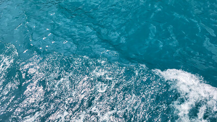 Obraz premium Background blue sea waves on a summer day