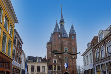 Saxon Gate (Sassenpoort) is a gatehouse in the city wall of Zwolle. Sassenpoort was built in 1409, is part of the Top 100 Dutch heritage sites. Zwolle, Netherlands. - obrazy, fototapety, plakaty