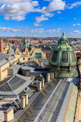 The dome of the FOK Symphony Orchestra against the backdrop of the roofs of Prague buildings