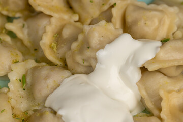 small dumplings with wheat flour and pieces of meat