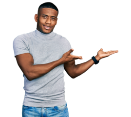 Young black man wearing casual t shirt inviting to enter smiling natural with open hand