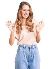 Young beautiful caucasian woman with blond hair wearing casual clothes disgusted expression, displeased and fearful doing disgust face because aversion reaction.