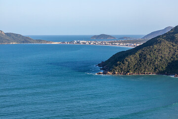 Ingleses beach with forest and buildings