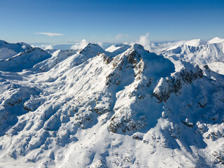 Fototapeta premium Winter view of Pirin Mountain near Polezhan and Bezbog Peaks, Bulgaria