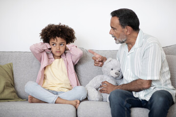 Senior Grandpa Scolding Naughty Grandchild Boy For Misbehavior At Home
