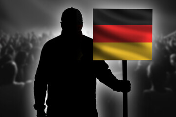Protester with Germany flag. Silhouette man with strike banner. Crowd of protesting people. Strike...