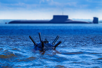 Naval bomb near submarine. Anti-ship mine. Underwater mine for protection of maritime borders. Old...