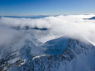 Fototapeta na wymiar Winter view of Pirin Mountain near Polezhan and Bezbog Peaks, Bulgaria