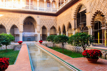 Patio de las Doncellas in Royal palace, Real Alcazar (built in 1360) in Seville, Andalusia, Spain....